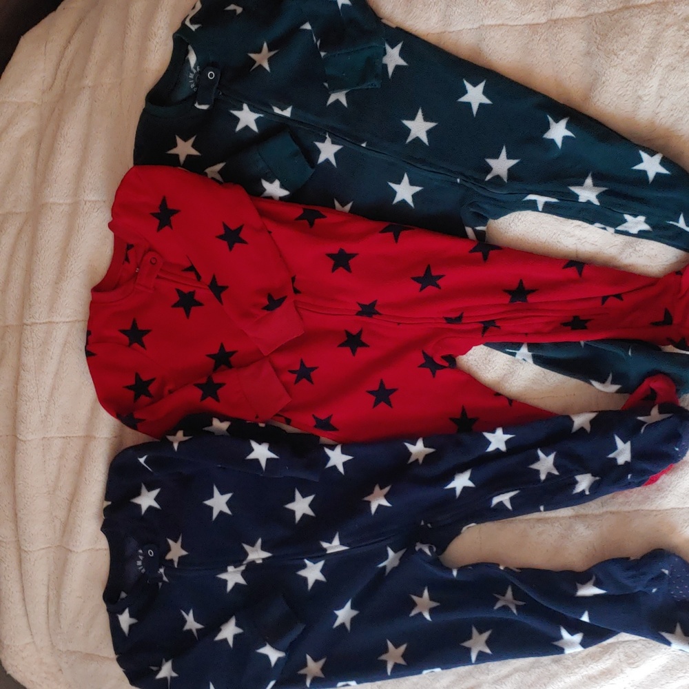 Fleece onsie pajamas by Primary selling as a 3 pack set for $30